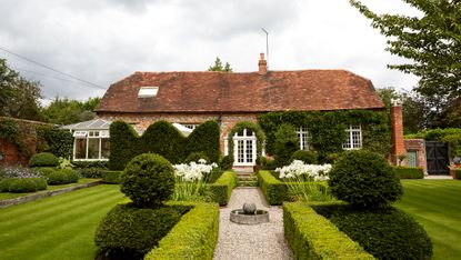 Cut hedges outside a country house
