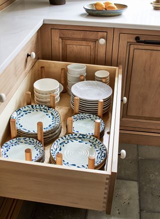 a deep drawer for dish storage in a kitchen