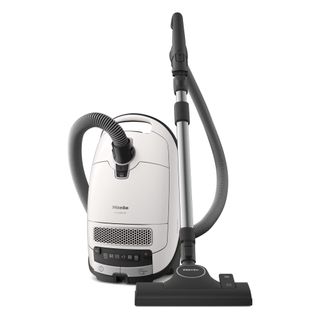 Miele Complete C3 Cat and Dog Canister Vacuum Cleaner against white background