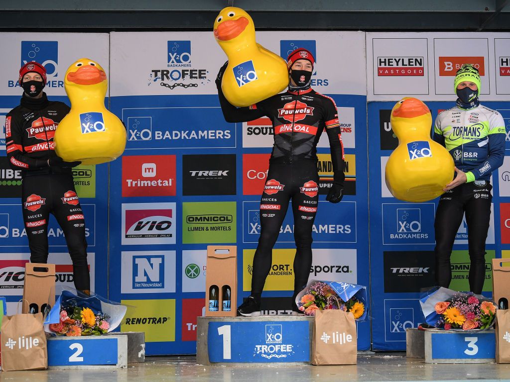Belgian Michael Vanthourenhout Belgian Laurens Sweeck and Dutch Corne Van Kessel on the podium after the mens elite race of the Krawatencross cyclocross in Lille the seventh stage out of 8 in the X2O Trofee Veldrijden competition Sunday 07 February 2021 BELGA PHOTO DAVID STOCKMAN Photo by DAVID STOCKMANBELGA MAGAFP via Getty Images