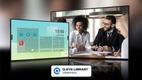 Two people using the Q-SYS plug-in on a large display. 