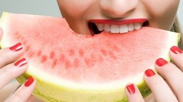 Woman Eating Watermelon