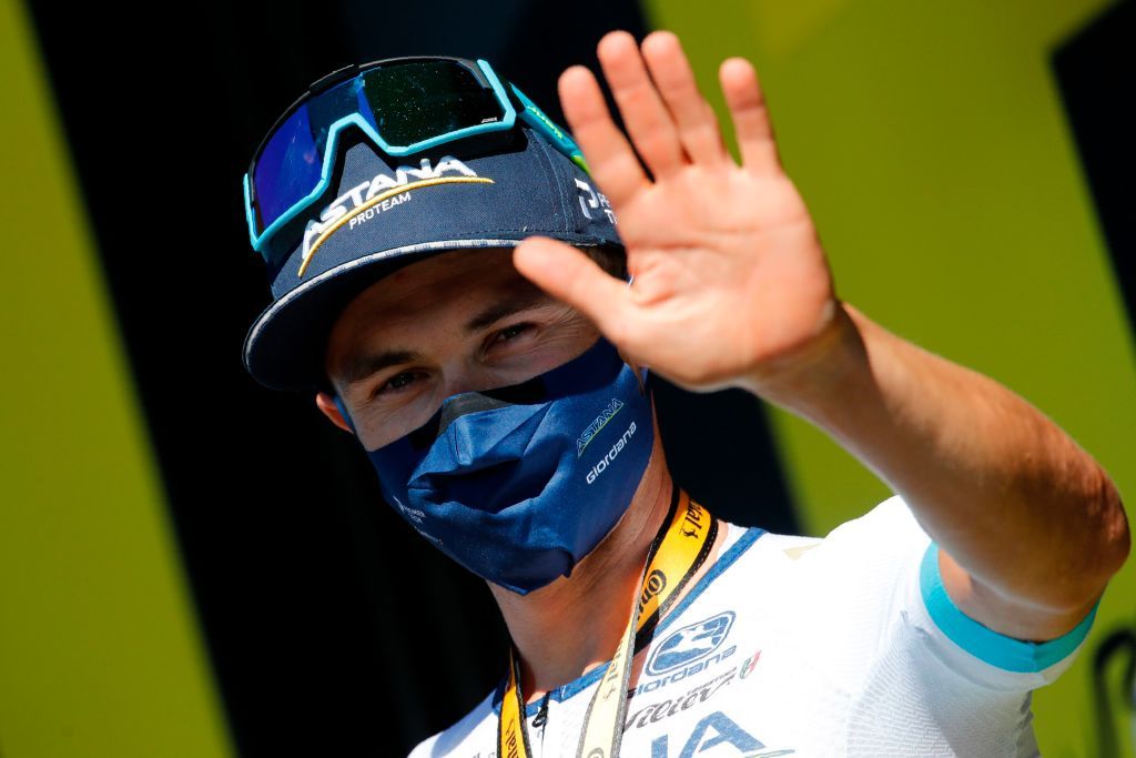 Stage winner Team Astana rider Kazakhstans Alexey Lutsenko celebrates on the podium after winning the 6th stage of the 107th edition of the Tour de France cycling race 191 km between Le Teil and Mont Aigoual on September 3 2020 Photo by Christophe Ena various sources AFP Photo by CHRISTOPHE ENAAFP via Getty Images