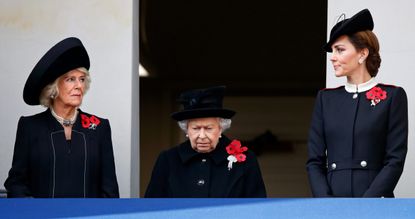 LONDON, UNITED KINGDOM - NOVEMBER 11: (EMBARGOED FOR PUBLICATION IN UK NEWSPAPERS UNTIL 24 HOURS AFTER CREATE DATE AND TIME) Camilla, Duchess of Cornwall, Queen Elizabeth II and Catherine, Duchess of Cambridge attend the annual Remembrance Sunday Service at The Cenotaph on November 11, 2018 in London, England. The armistice ending the First World War between the Allies and Germany was signed at Compiègne, France on eleventh hour of the eleventh day of the eleventh month - 11am on the 11th November 1918. This day is commemorated as Remembrance Day with special attention being paid for this year's centenary. (Photo by Max Mumby/Indigo/Getty Images)