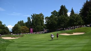 Celine Boutier and her caddie at the Evian Championship