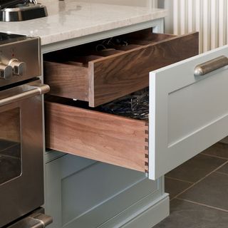 cabinetry with hidden internal storage drawers