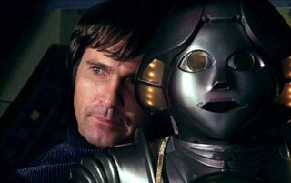 Gil Gerard as Buck Rogers with friendly robot Twiki