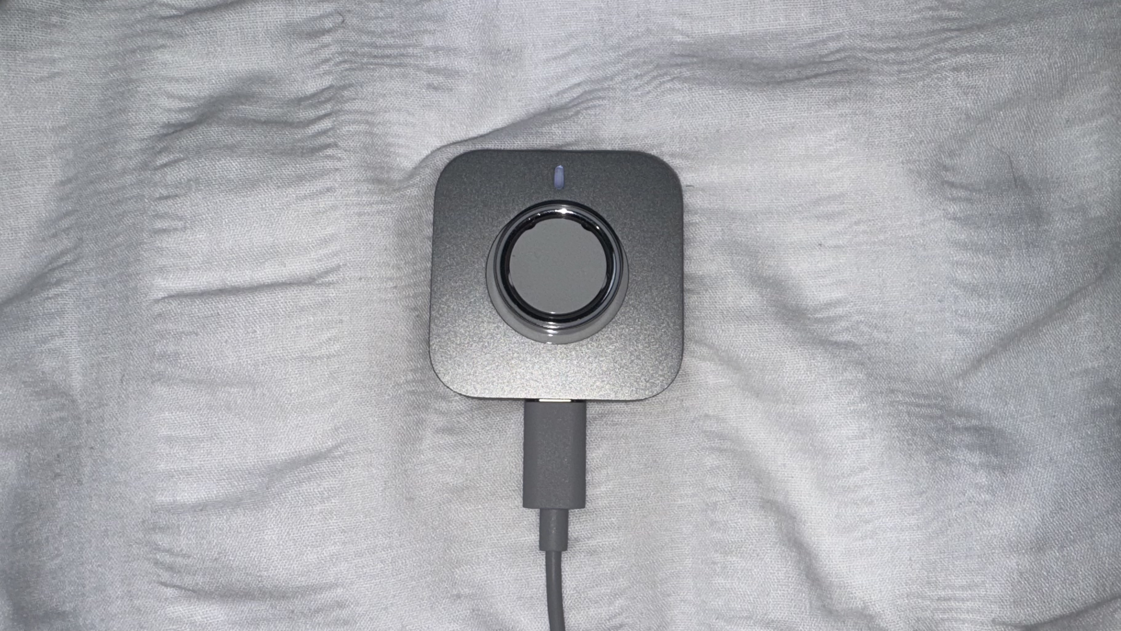 Oura Ring 4 on charging unit