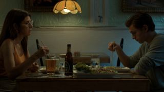 Aunt May (Marisa Tomei) and Peter Parker (Tom Holland) have dinner in Spider-Man: Homecoming