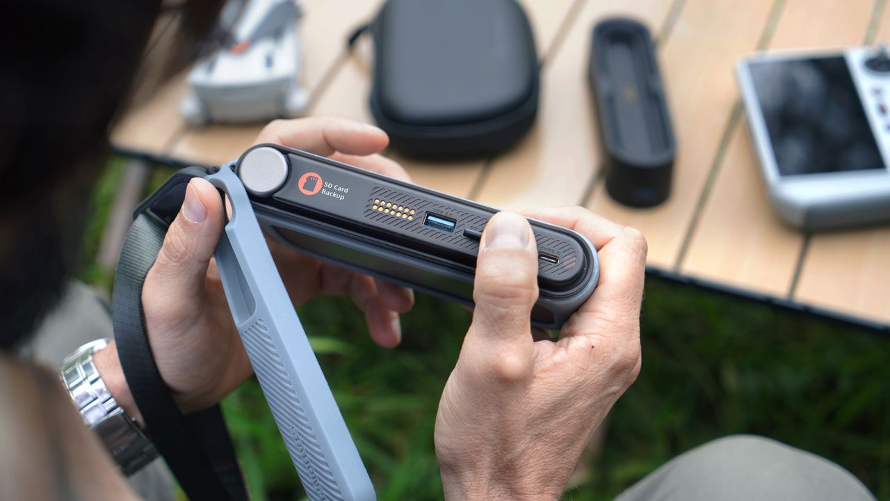 A lifestyle image of the PocketCloud reading an SD card