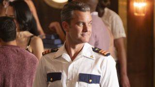Joshua Jackson smiles coyly as Max Bankman on Doctor Odyssey.