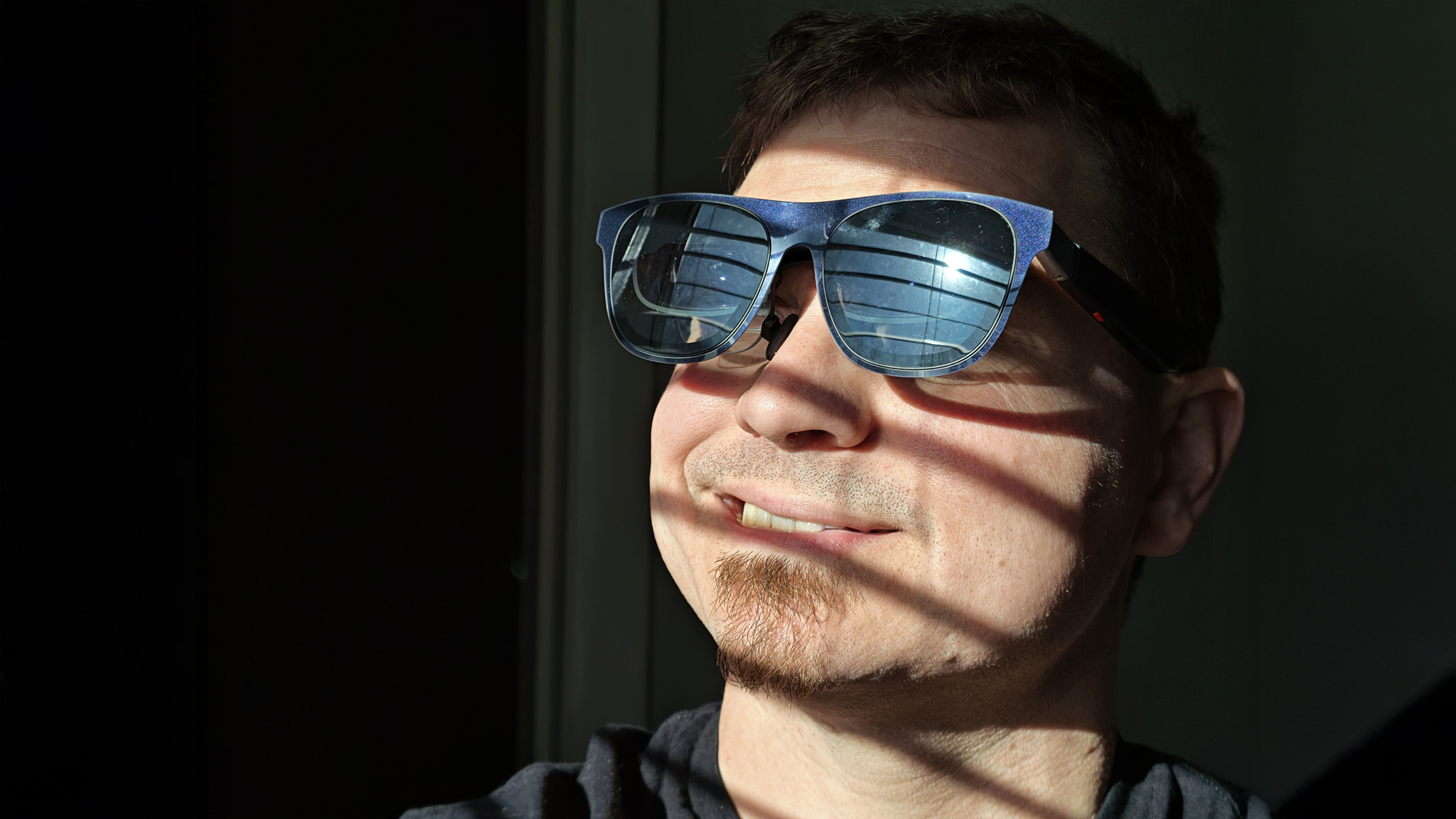 Wearing a pair of Xreal 1S smart glasses
