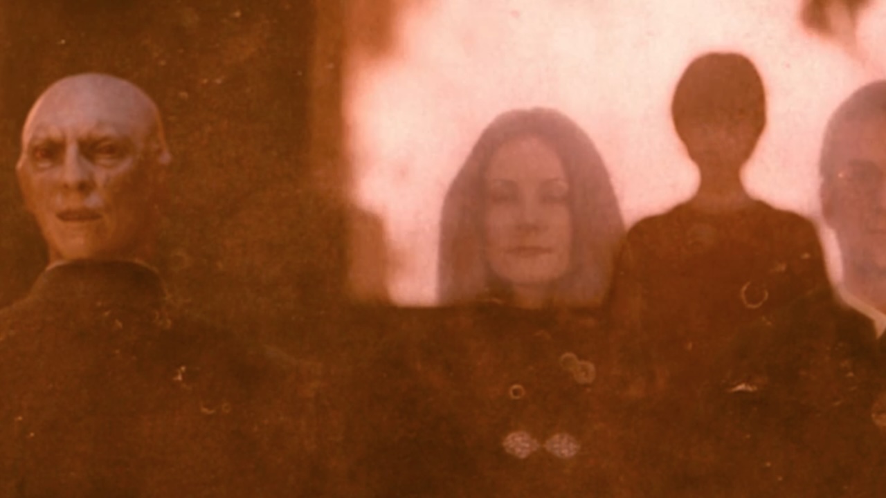 Voldemort's face in Quirrell's head in front of the mirror of Erised