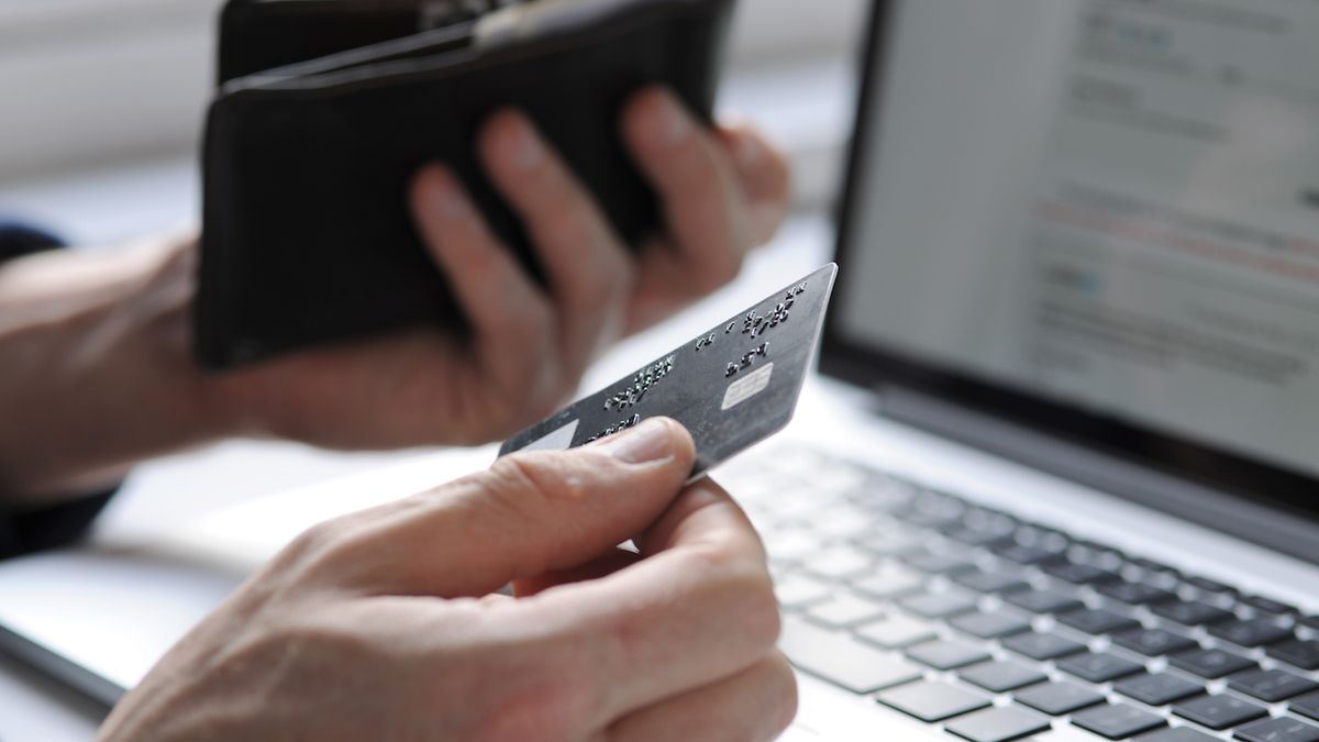 Person buying products online using a credit card