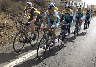 Lance Armstrong rides with Astana teammates during a hard workout