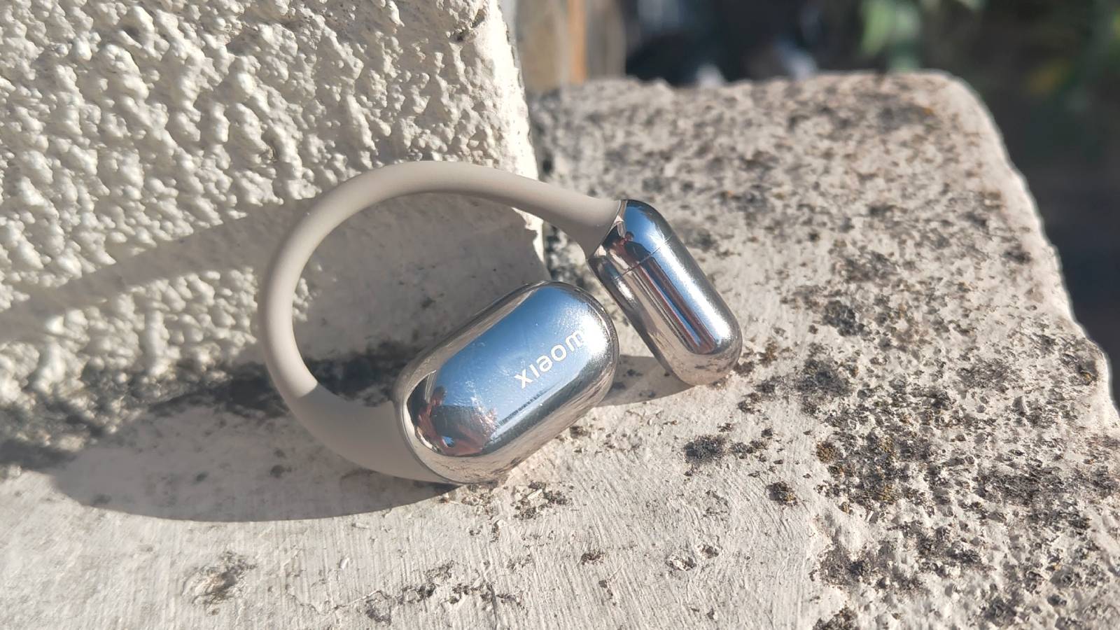 The Xiaomi OpenWear Stereo Pro in a sunny outdoor setting.