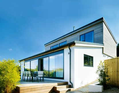 Improve your home without planning permission. Pocket sliding doors in contemporary extension photographed by nigel rigden