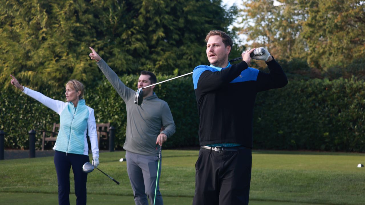 Golfers shouting fore