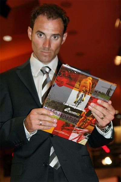 The riders were presented with a book of images from this year's race.