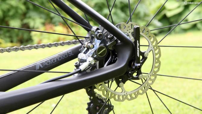 The rear brake caliper on the new Giant Defy Advanced SL mounts to the chain stay, allowing the seat stays to be very slim