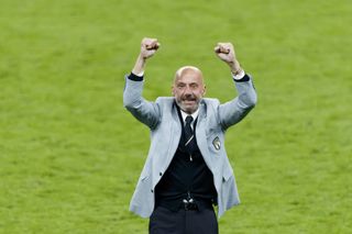 Italy's assistant manager Gianluca Vialli celebrates after the Azzurri's Euro 2020 win over England in July 2021.