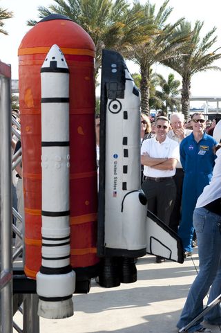 At NASA's Kennedy Space Center Visitor Complex in Florida, this shuttle-shaped cake appeared following NASA Administrator Charles Bolden's announcement regarding the retirement locations of the four orbiters. Created by Buddy Valastro of Carlo's Bakery (