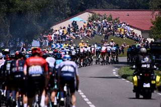 The pack rides during the 19th stage of the 108th edition of the Tour de France cycling race 207 km between Mourenx and Libourne on July 16 2021 Photo by AnneChristine POUJOULAT AFP Photo by ANNECHRISTINE POUJOULATAFP via Getty Images