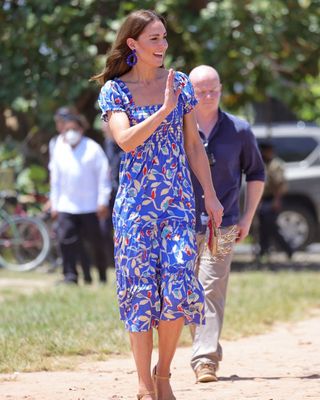 Kate Middleton wearing a square neck floral dress