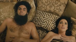 Sacha Baron Cohen in bed with Megan Fox in The Dictator