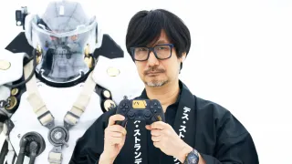 Hideo Kojima holding the upcoming Death Stranding 2 DualSense.