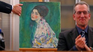 The missing Gustav Klimt painting 'Portrait of a Lady' is displayed after being stolen 23 years ago.