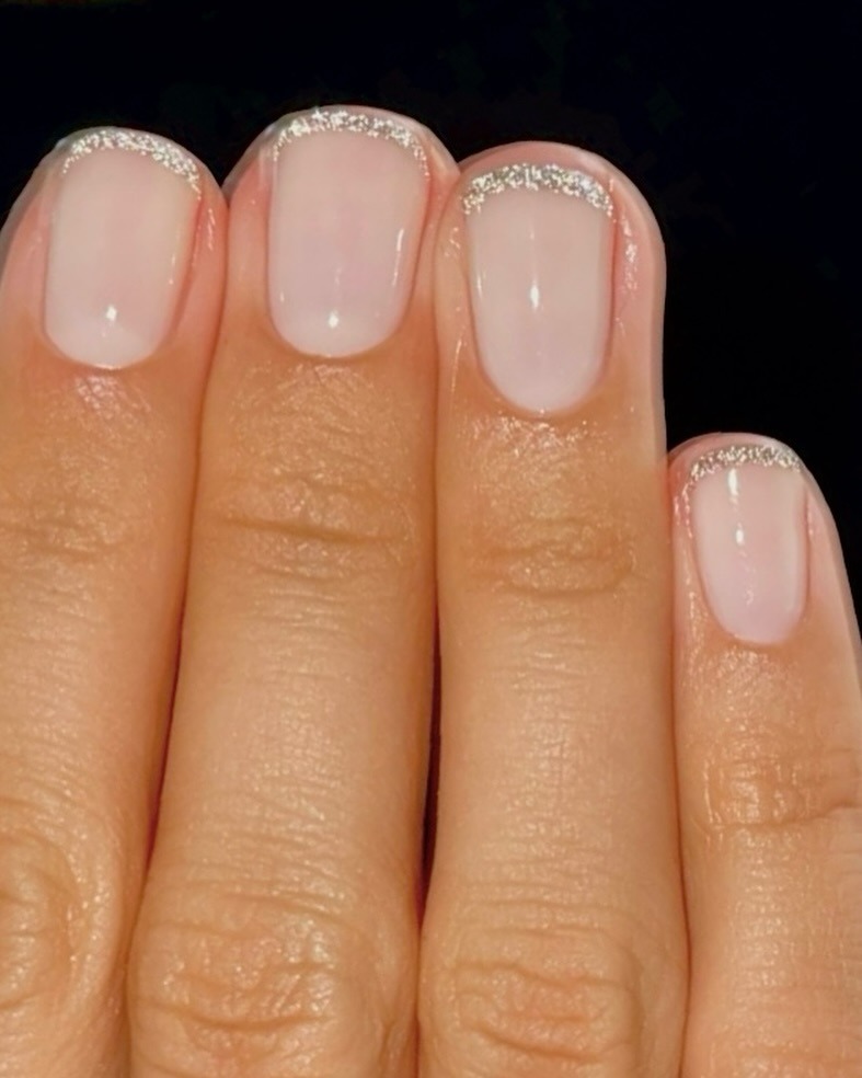 Glitter French tips.