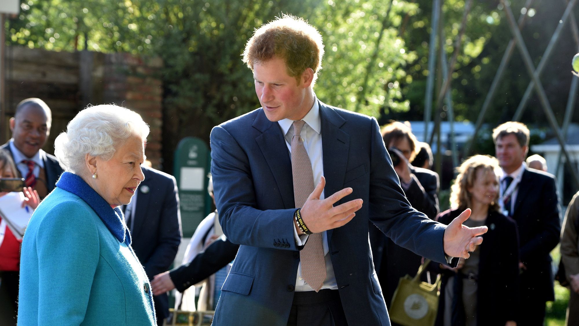 The late Queen Elizabeth II and Prince Harry attend the Chelsea Flower Show