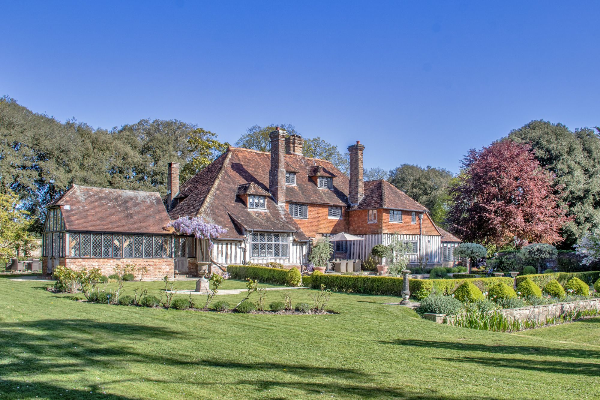 'The perfect timber-framed Sussex house', former home of J. M. Barrie and a 1970s rock god, up for sale at £3.75 million