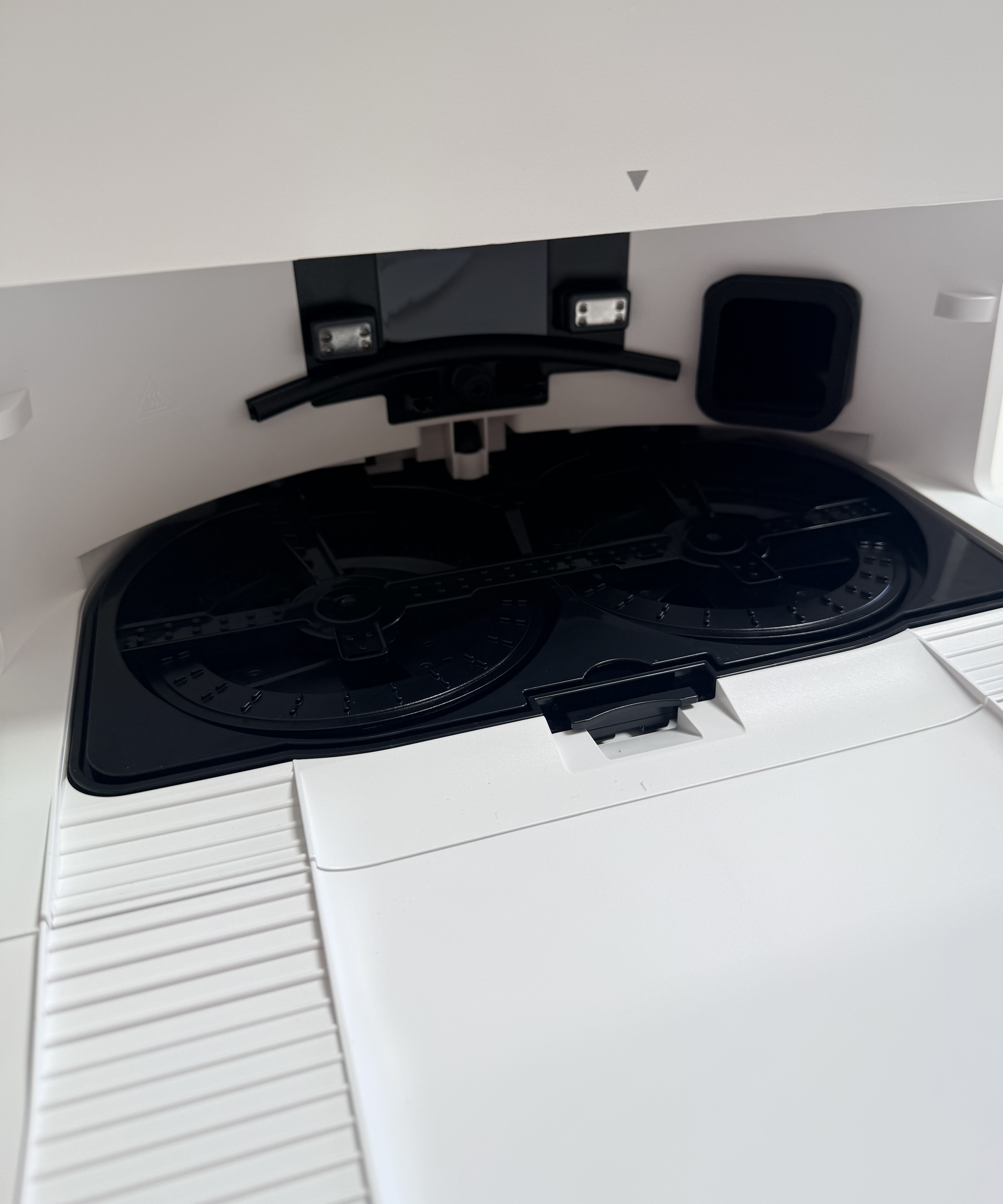 Mop washing tray inside the Ecovacs Deebot T50 Pro Omni OMNI Station with the robot docked