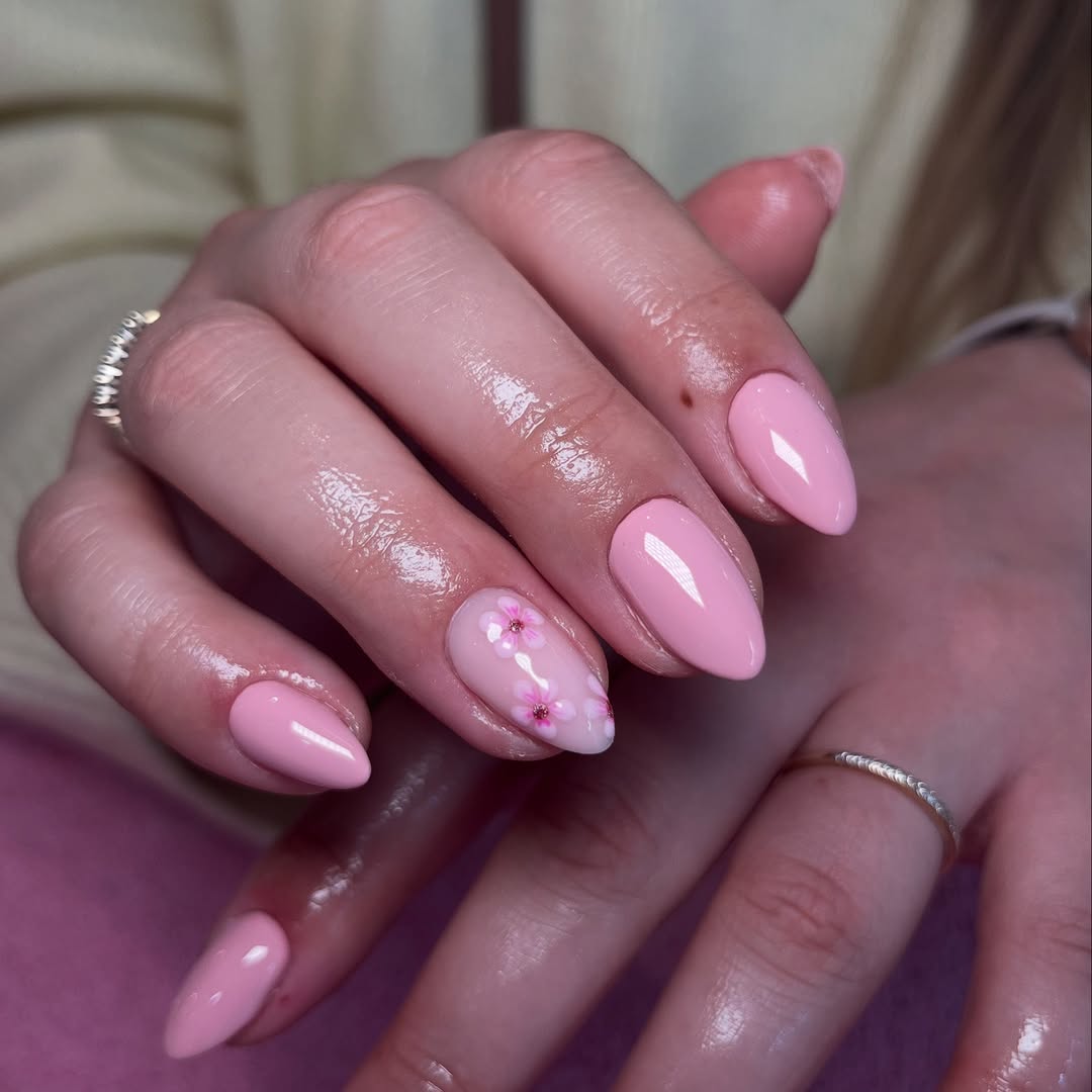 cherry blossom nails with an accent nail
