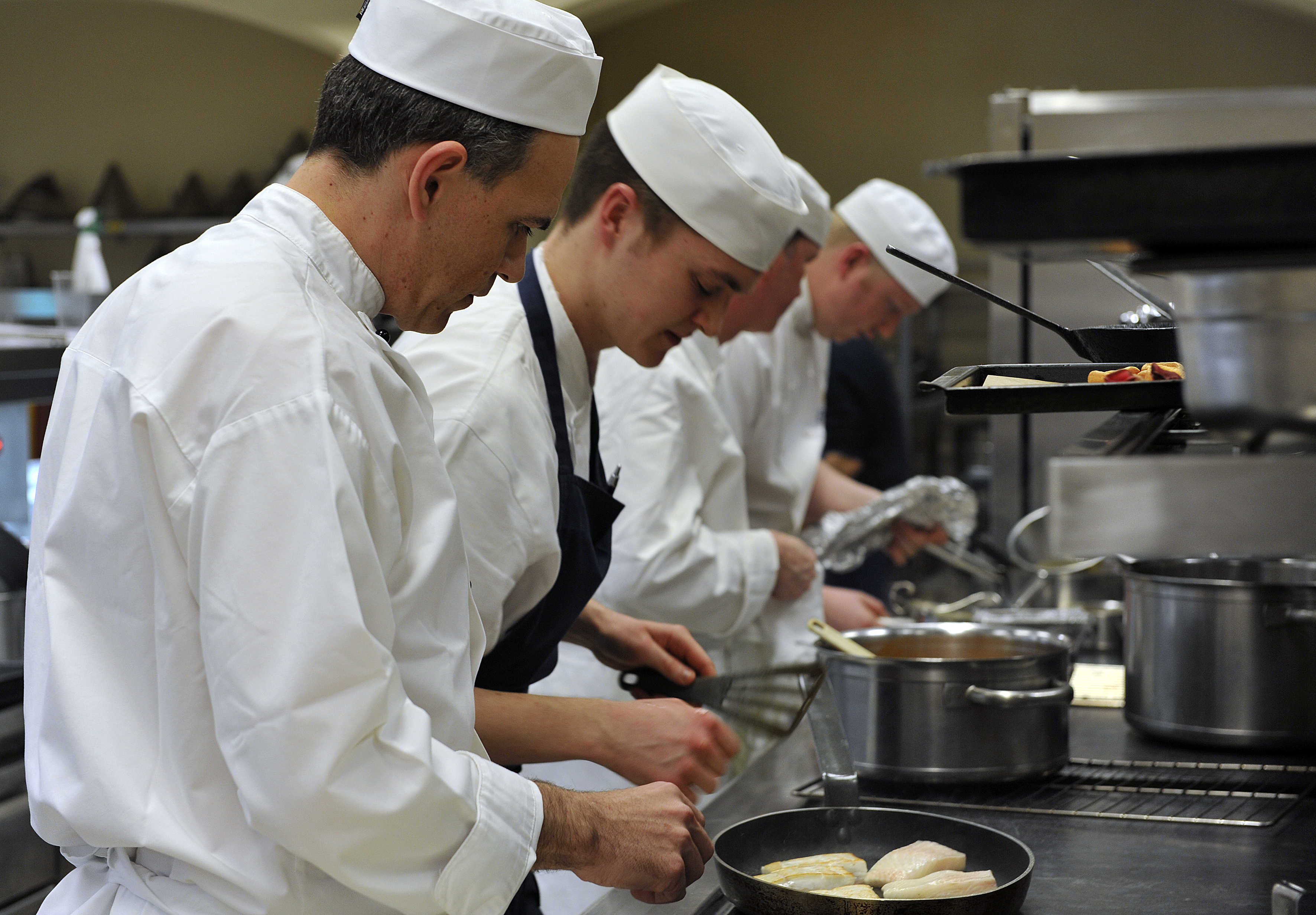 Chefs working in the kitchen at Buckingham Palace