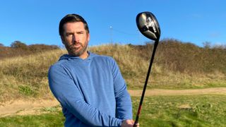 Joe Ferguson testing the Eleven Golf hybrid iron