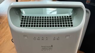 close up of front of white dehumidifier
