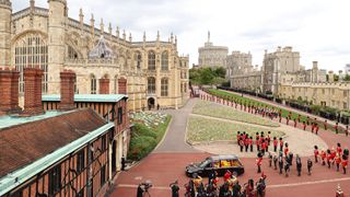 The Royal State Hearse carrying the coffin of Queen Elizabeth II arrives at Windsor Castle