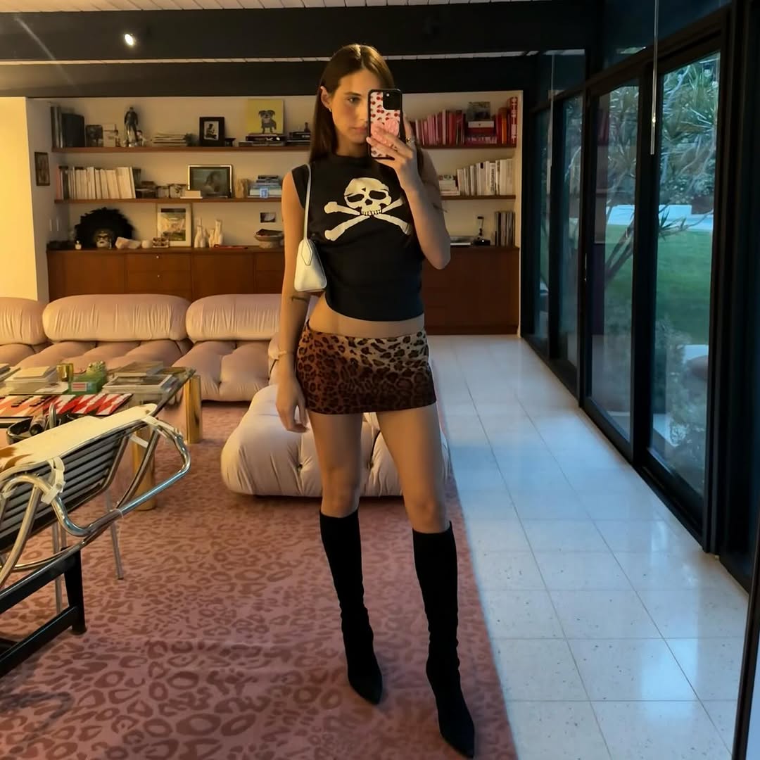 woman wearing fall skirt outfit 2025