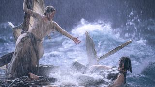 Galadriel and Halbrand on the raft in The Rings of Power.