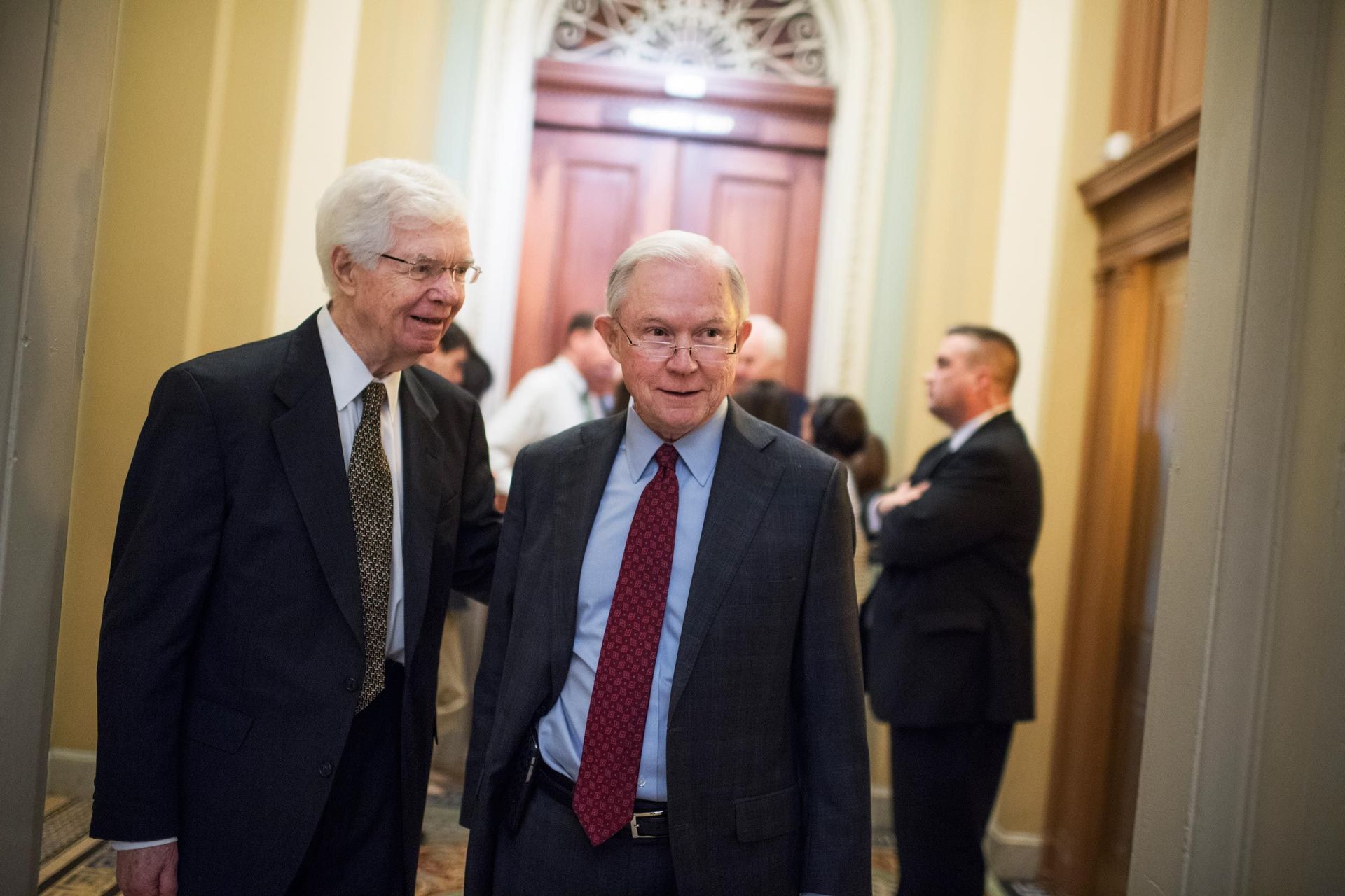 Glasses, Coat, Dress shirt, Trousers, Collar, Shirt, Standing, Suit, Outerwear, Tie,