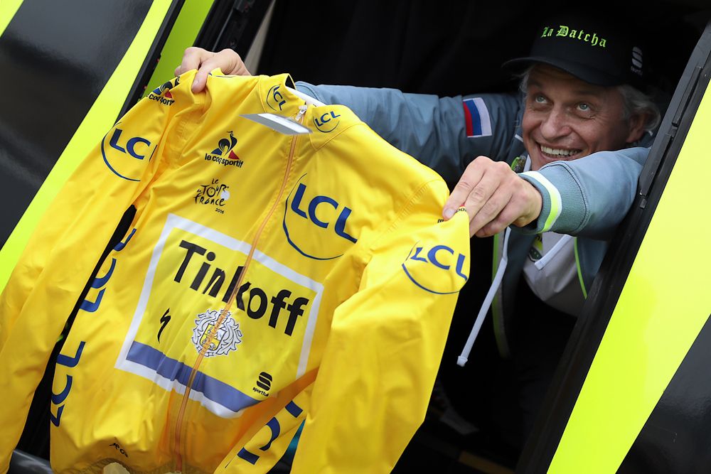 Oleg Tinkov shows off one of Peter Sagan's yellow jerseys
