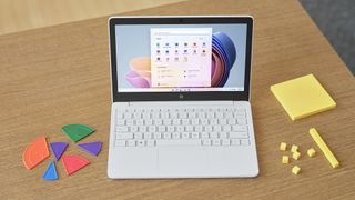 Microsoft Surface Laptop SE placed on a school desk