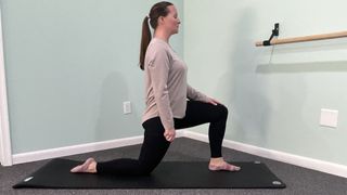 Physiotherapist Nicki Evans demonstrates hip flexor stretch