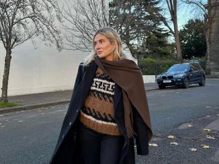 Lucy Williams in a fair isle sweater and scarf