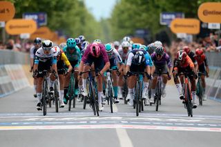 Lidl-Trek's Danish rider Mads Pedersen (C) sprints to the finish line to win the 3rd stage of the 108th Giro d'Italia cycling race, 160km from Vlore to Vlore in Albania, on May 11, 2025. (Photo by Luca Bettini / AFP)