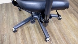 The adjustment levers on the side of the BodyBilt Classic 2500 Series office chair