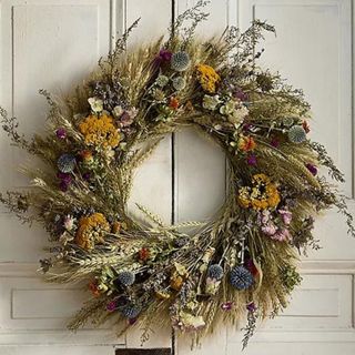 Preserved Perennial Garden Wreath against a white background.